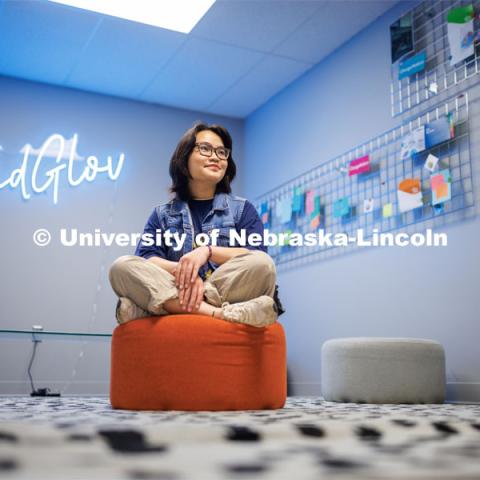 Thi Hoang Mai Vu, a CoJMC senior from Vietnam is featured for Asian and Pacific Islander Desi American Heritage Month. She is posing in one of the College of Journalism and Mass Communications' sponsored break-out rooms in the Experience Lab in Anderson Hall. May 10, 2023. Photo by Craig Chandler / University Communication.